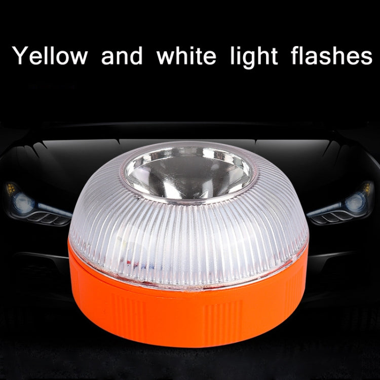 Car LED emergency warning light with chrome dome on orange base, mounted on vehicle