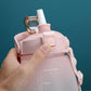 Large belly straw water cup with hand-held lid latch, pale pink body and measurement marks