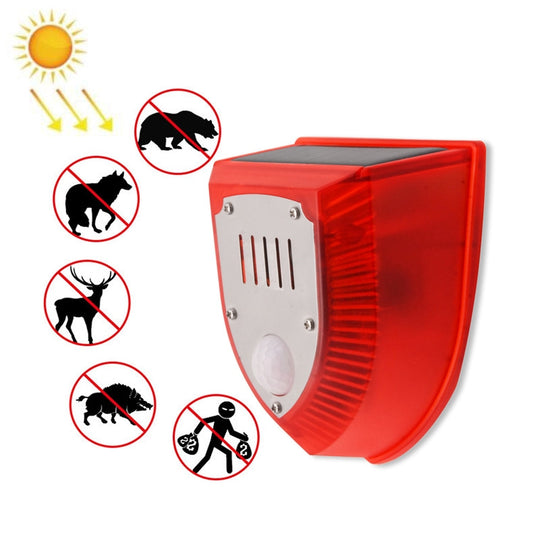 Solar animal repeller alarm in red housing, with front grille and motion sensor window