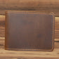 Dark brown leather wallet back panel with contrast yellow stitching around edges