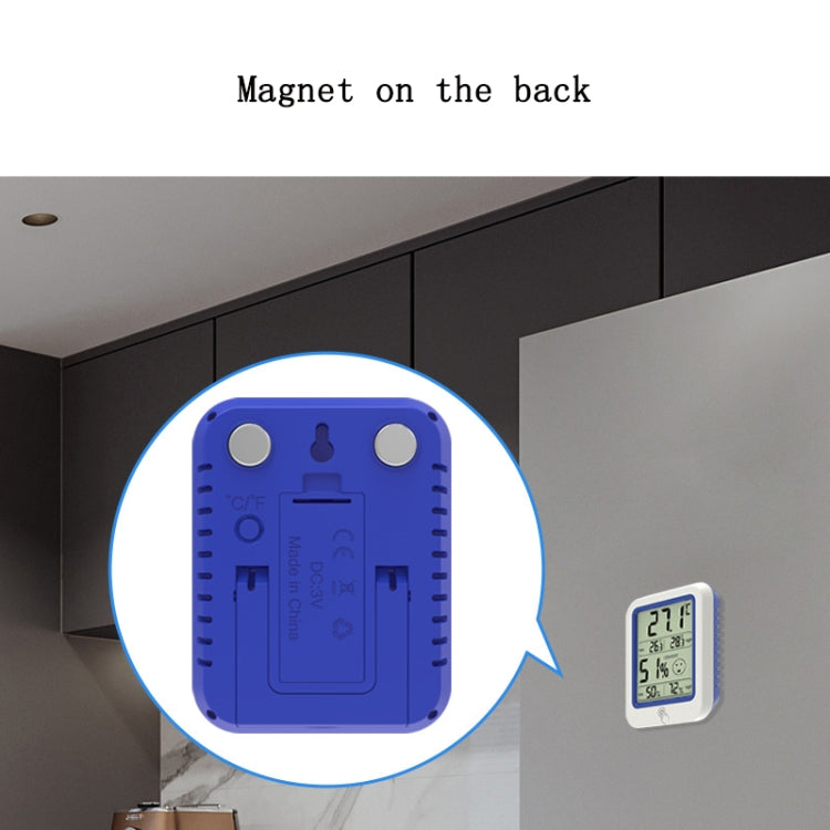 Digital wall thermometer and hygrometer showing back panel with magnet mounting
