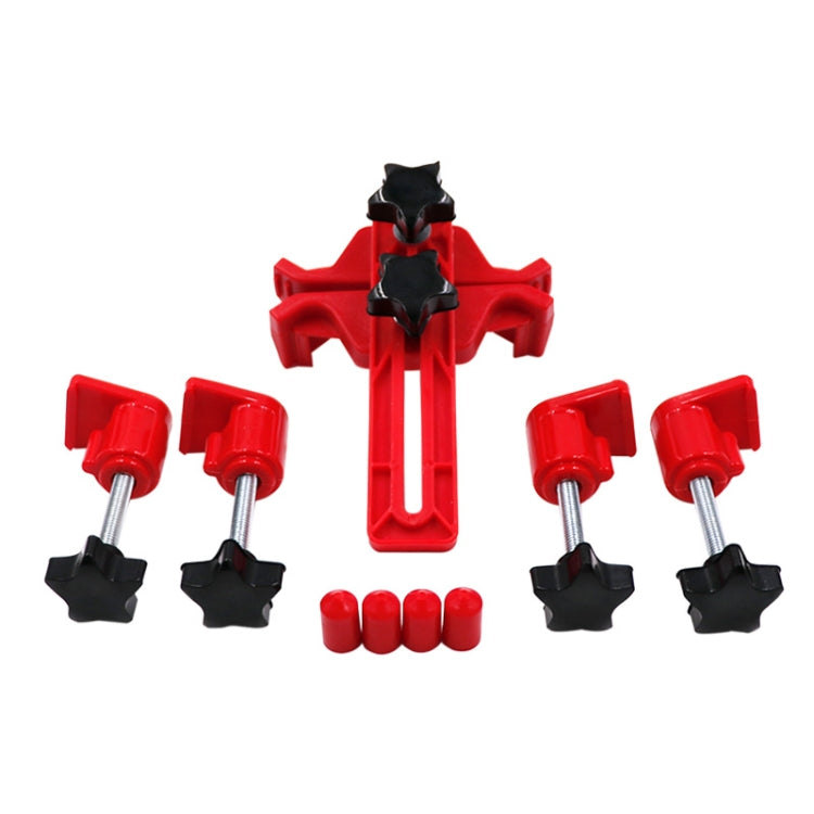 Red cam locking fixture set with multiple black star caps and threaded posts