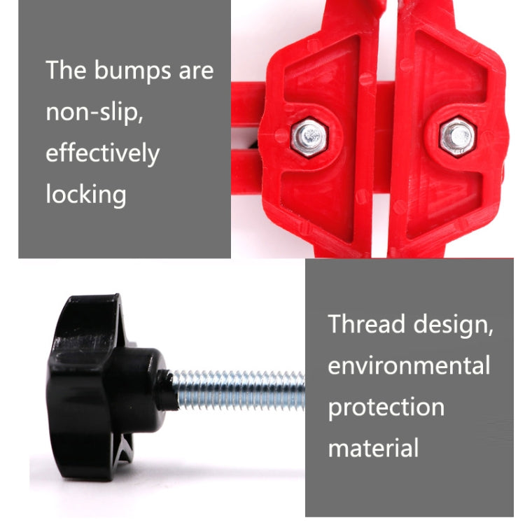 Red cam locking clamp with black non-slip star bumps and two silver bolts