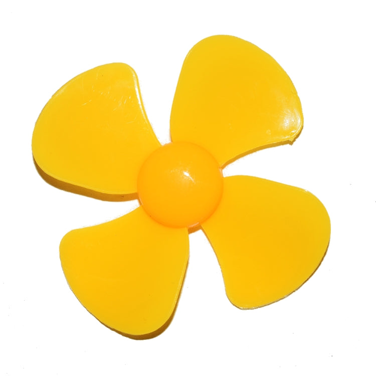 Bright yellow four-blade propeller with round center hub