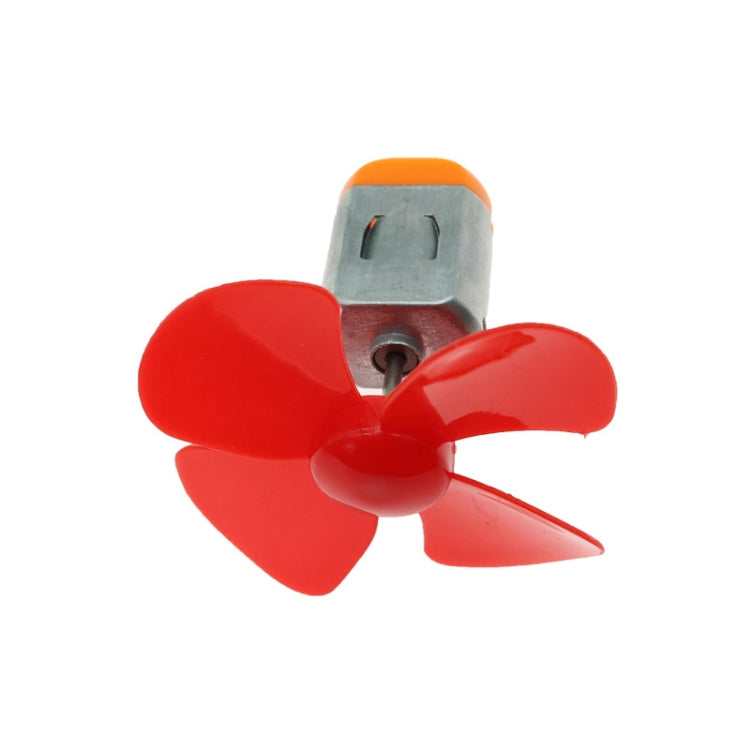Red four-blade propeller attached to a gray motor bracket