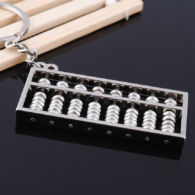 Abacus keychain pendant showing silver beads in open frame, with chain and ring