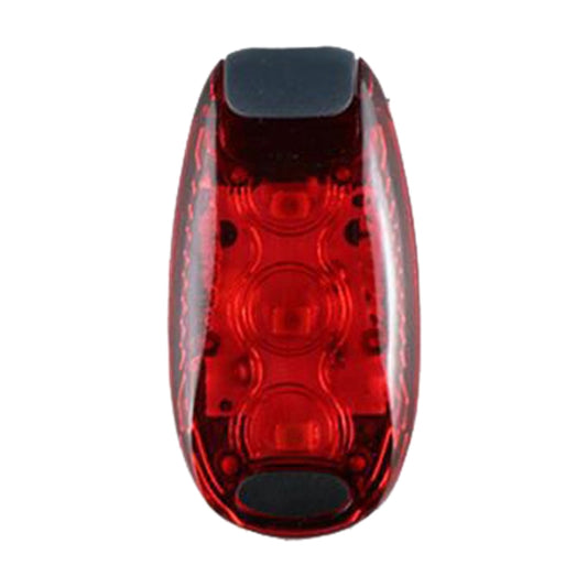 Red bicycle tail light with clear dome lens, circular LED pattern, and black top cap