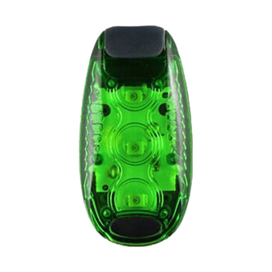 Green bicycle tail light with clear dome lens, circular LED pattern, and black top cap