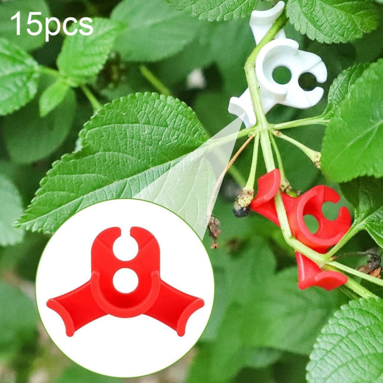 Red plant training clips with three-prong grip, shown in close-up