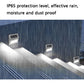 Stainless solar LED stair wall light illuminating steps under wet weather