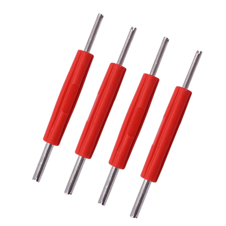 Set of red-handled valve core wrench keys with silver double-ended prongs