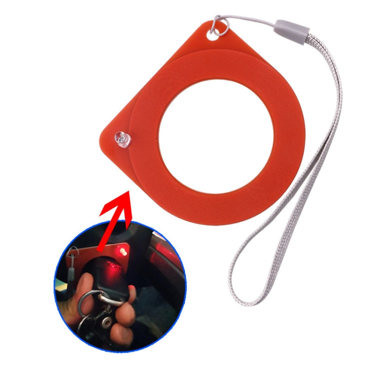 Red anti-theft induction coil detector with lanyard cord and visible front sensing ring
