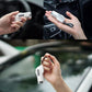 White safety hammer window breaker keychain in hand for emergency use