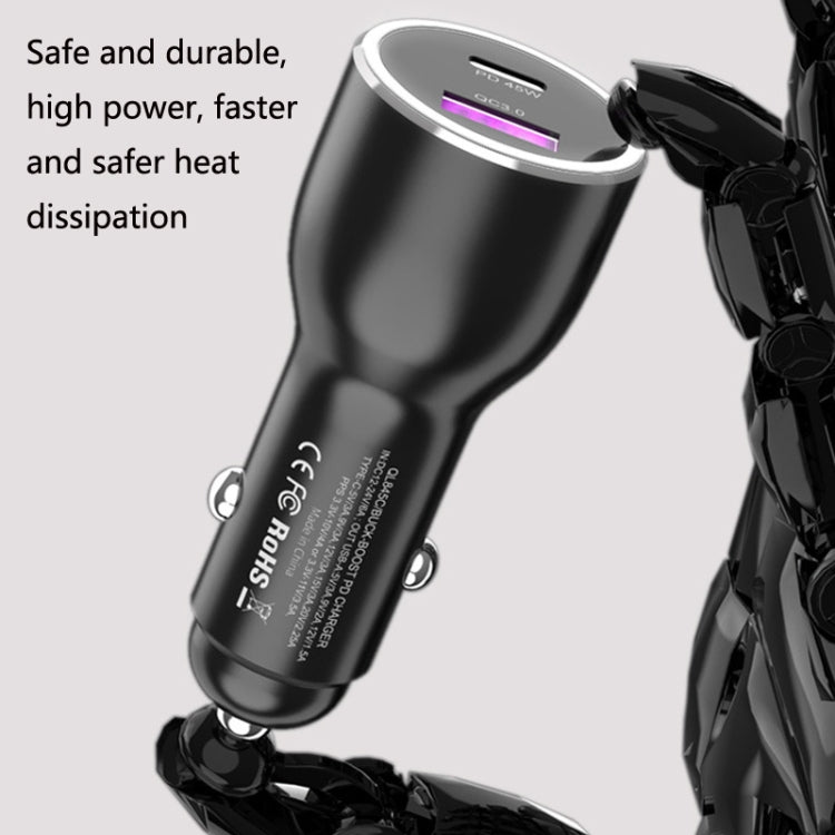 Black car phone charger with dual USB ports on top and metal charging ring