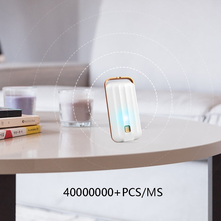 White hanging neck air purifier placed on a countertop with rose-gold edge; airflow glow