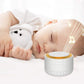 White cylindrical white-noise device with warm orange top ring and row of buttons