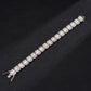 Silver-tone tennis bracelet with square rhinestone links and small clasp end.