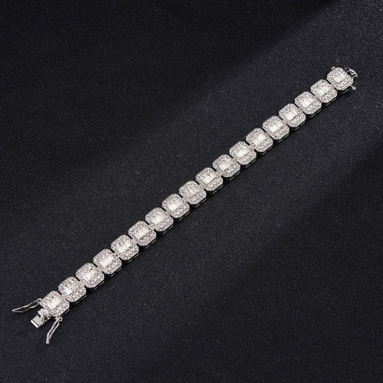 Silver-tone tennis bracelet with square rhinestone links and small clasp end.