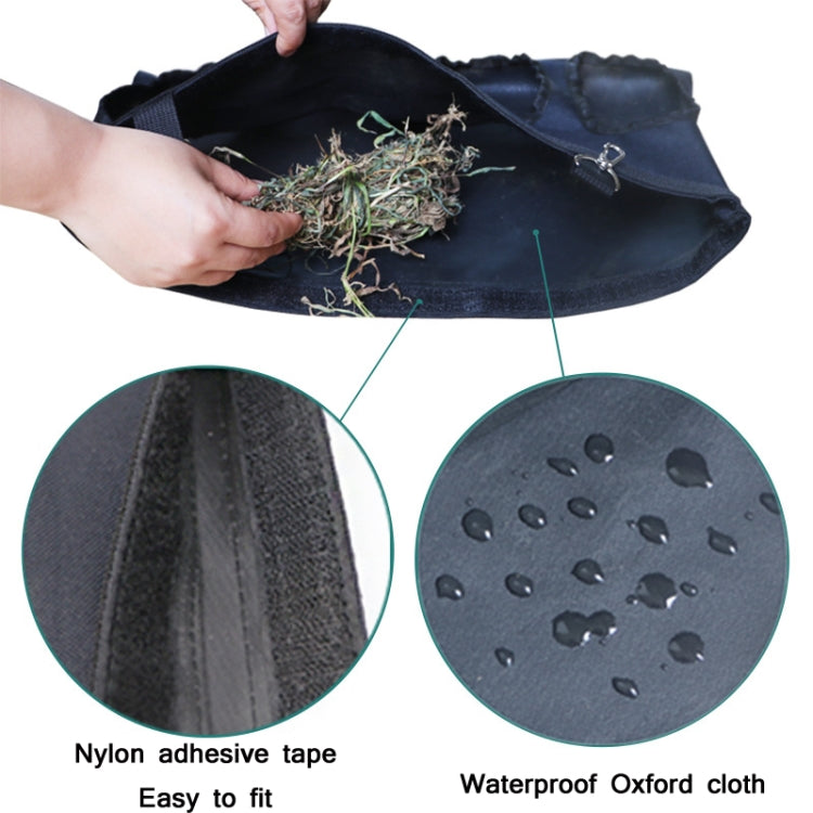 Black hanging hay storage bag with interior fill of hay and waterproof Oxford cloth material