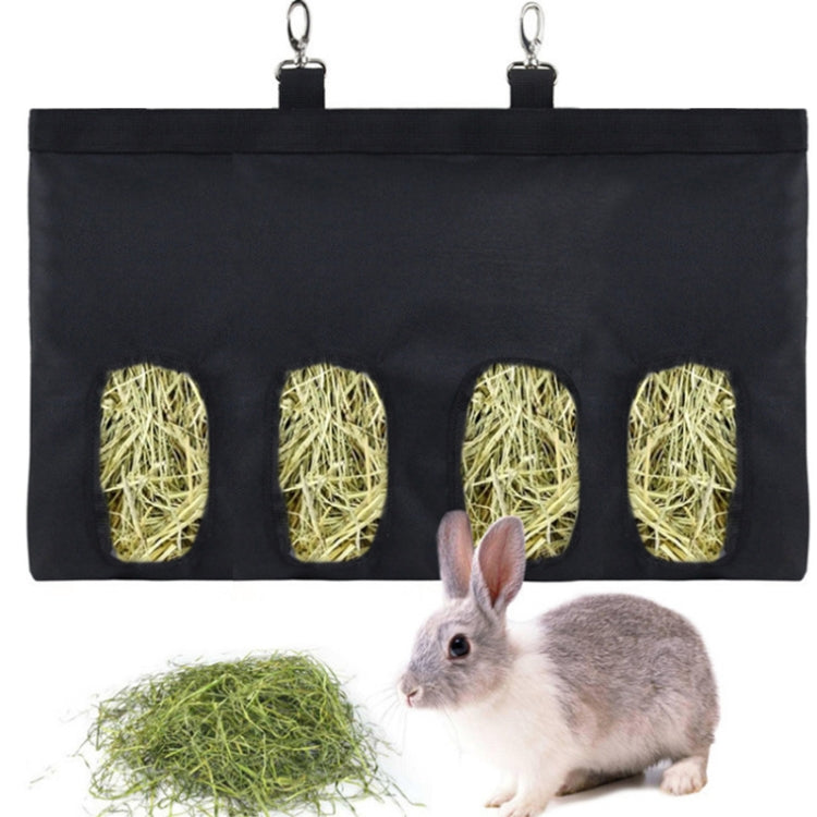 Black hanging hay storage bag with four rectangular hay windows and metal hanging hooks