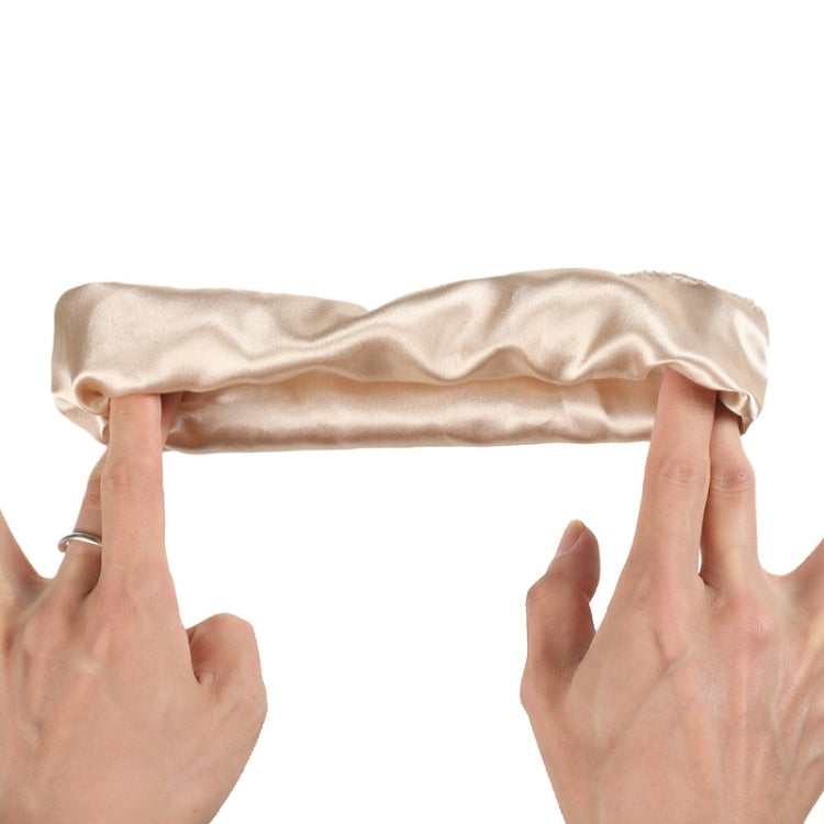 Beige satin long head wrap with tie ribbons, held by hands