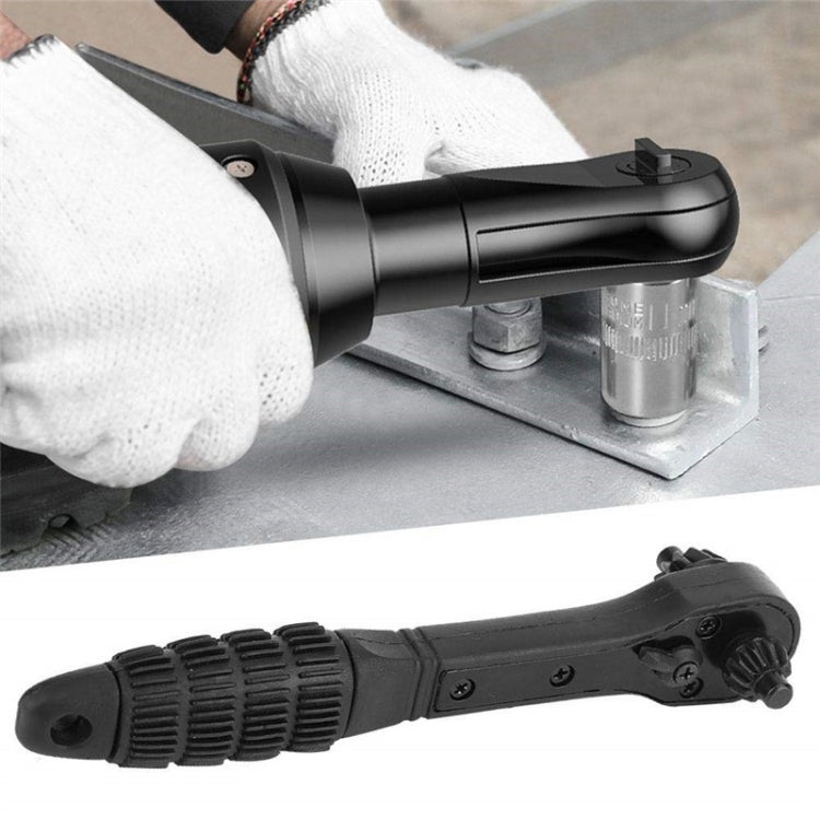 Black drill chuck key wrench tightening a fastener with ridged handle