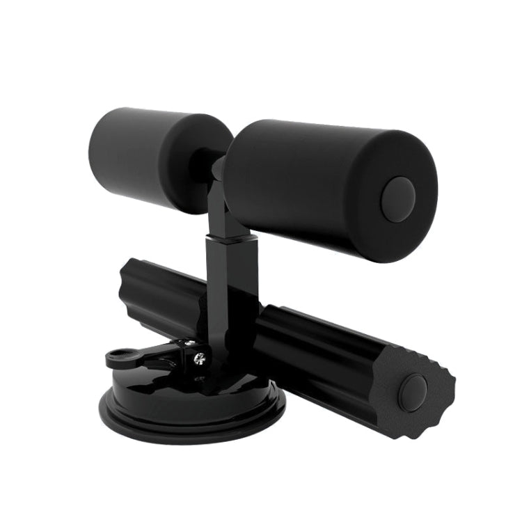Black sit-up aid with two suction bases, foam rollers, and ankle supports