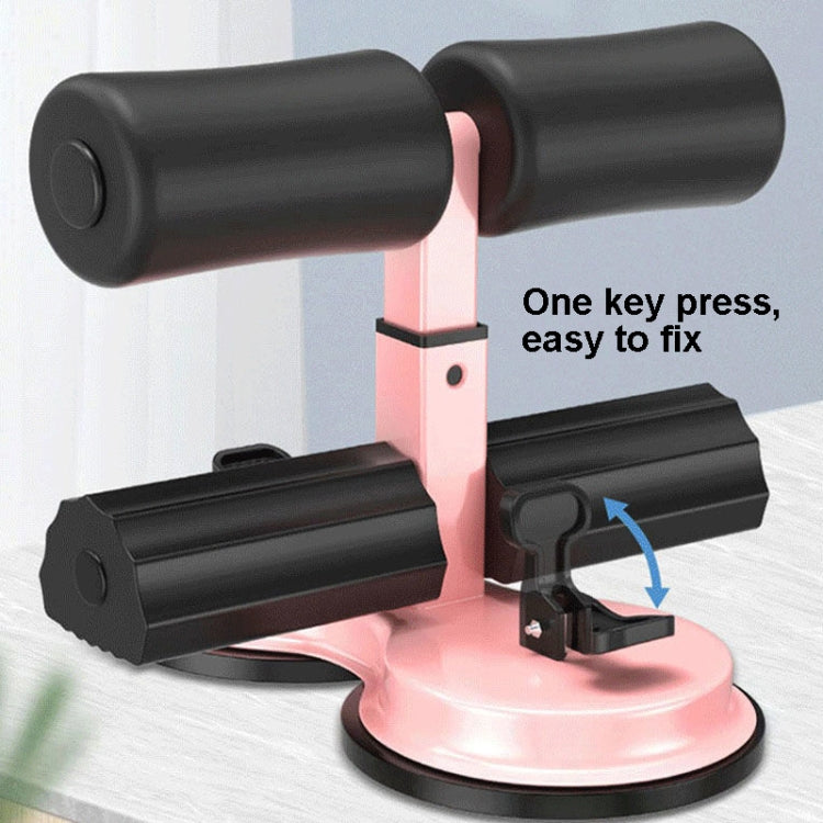 Sit-up aid exercise device with black suction mounts and pink base, key-press latch