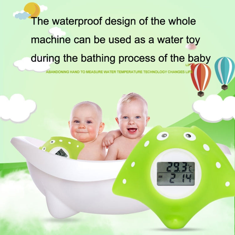 Green fish water thermometer with LCD reading, shown beside a baby bath