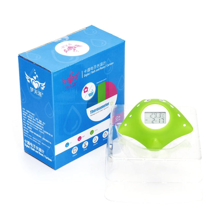 Green fish-shaped electronic water thermometer in clear protective cover and blue box
