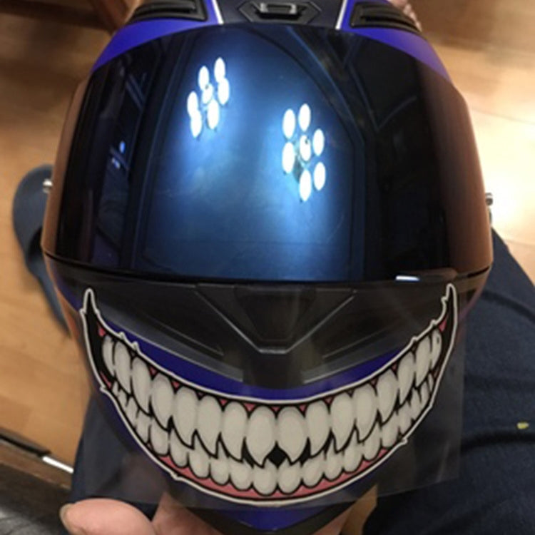 Motorcycle helmet teeth sticker on a blue helmet, white teeth with red outline
