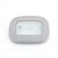 Gray dome LED trunk light with clear front panel and white illumination