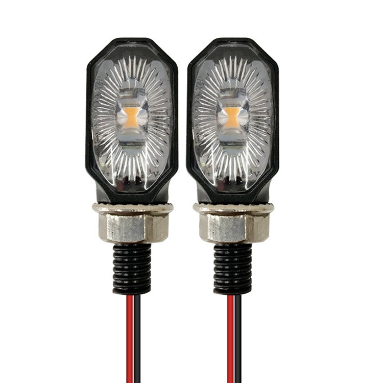 LED motorcycle turn signal lamps, amber lens with black housing and metal mounting, pair