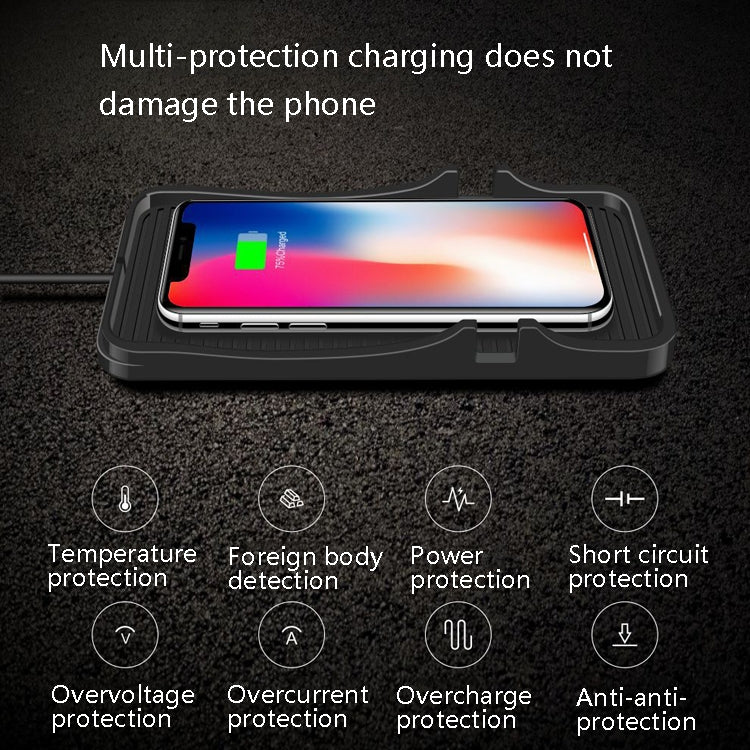 Black car wireless charging pad holding a smartphone on the textured base