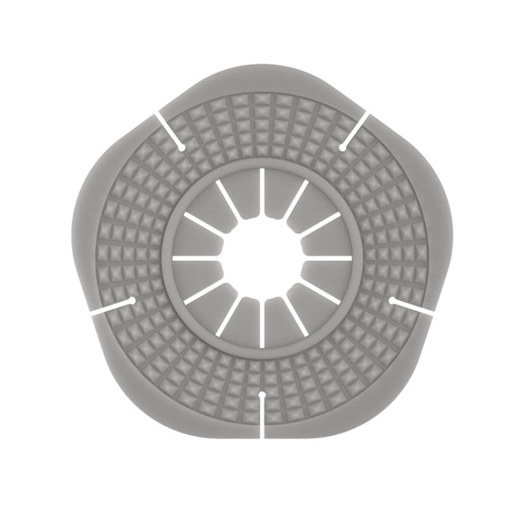 Gray silicone wiper hole cover, textured grip bumps, small center opening