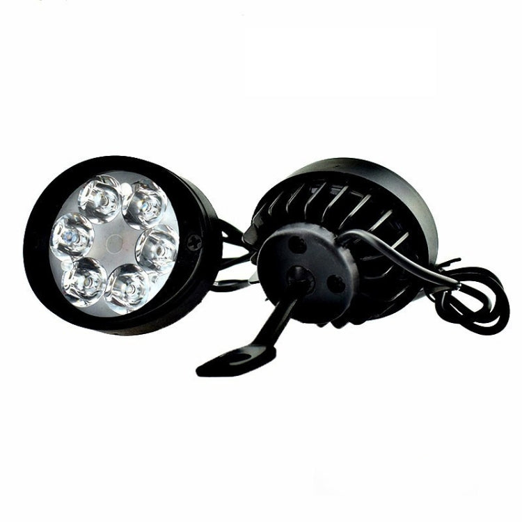 Pair of round LED motorcycle fog lamps with mounting bracket and wire harness