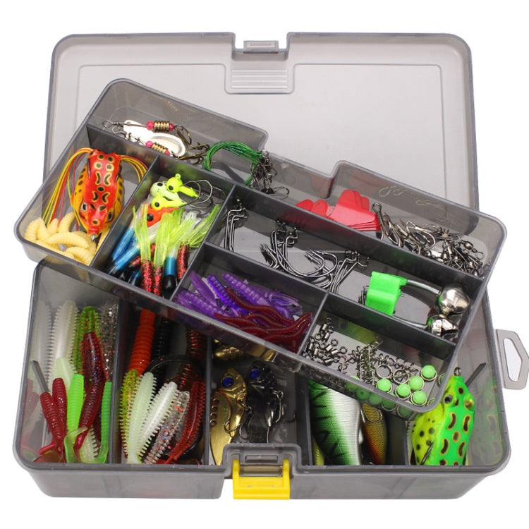 Fishing lure hook accessories set in open gray tackle box with segmented compartments