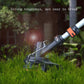 Orange-and-black lawn mower string trimmer in use on grass