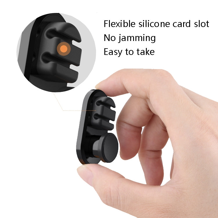 Black car sticky storage hook with flexible silicone card slot, held in hand