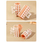 Two-piece lazy air bang curlers with white frames and orange rollers