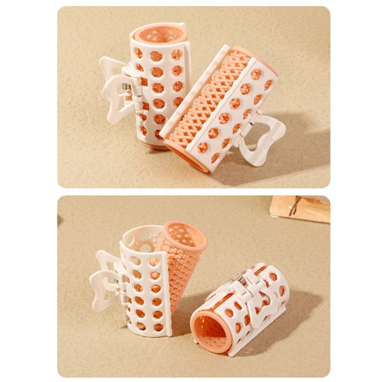 Two-piece lazy air bang curlers with white frames and orange rollers