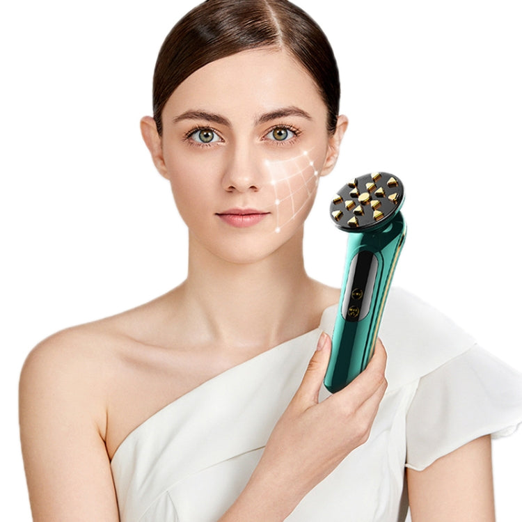 Teal facial RF beauty device held near cheek with gold electrode head