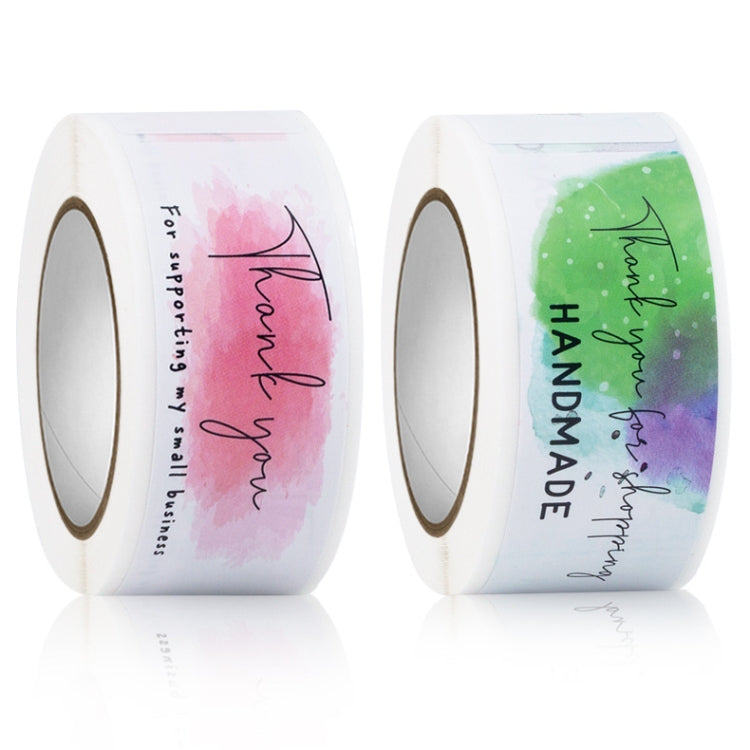 Two rectangle sticker seal label rolls: pink and green watercolor "thank you" script
