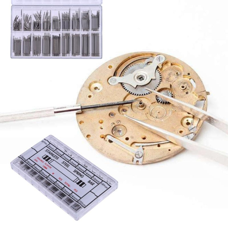 Stainless steel spring bars kit with watch tool and movement, plus labeled storage box