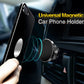 Black universal magnetic car phone holder with round head mounted on air vent