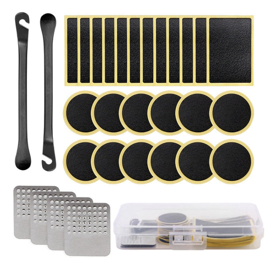 Bicycle tire repair kit with black tire levers, abrasive patches, plugs, and storage box