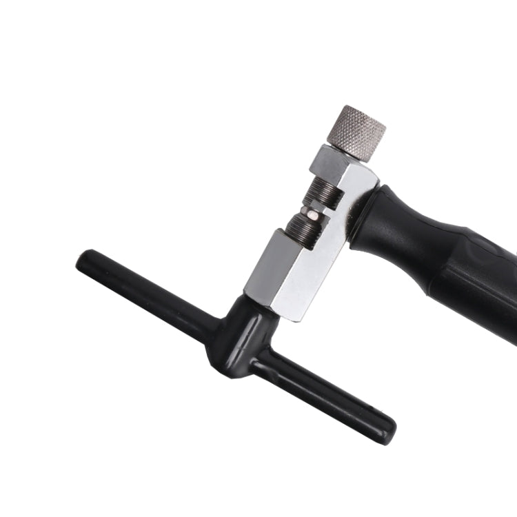 Bike chain tool with metal clamp piece, textured thumb screw, and black cross handles