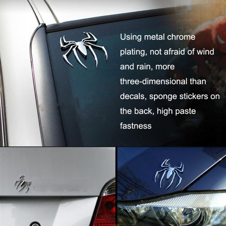Chrome metal spider car sticker on a vehicle hood near the windshield edge