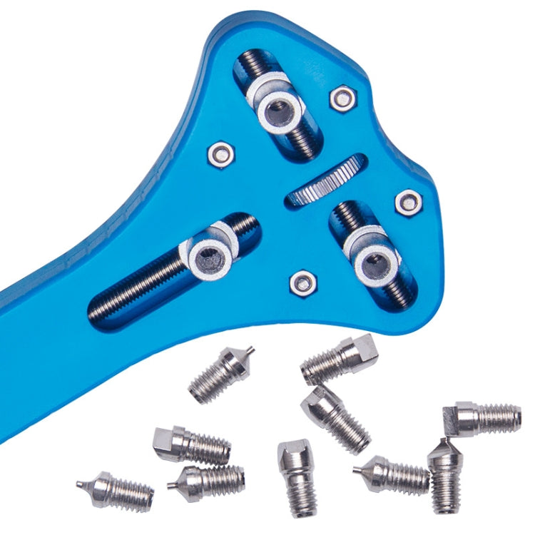 Three-prong watch opener tool head close-up with blue plate and screws