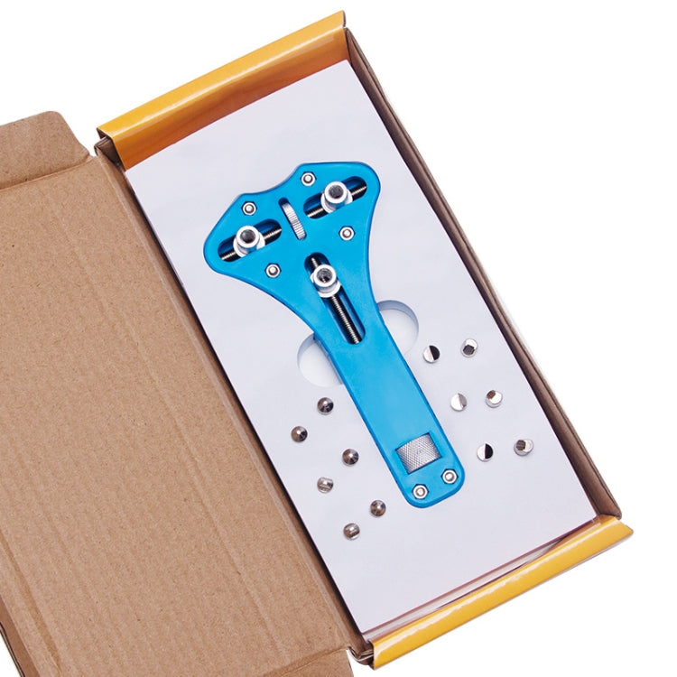 Three-prong watch opener set in open box with blue tool and spare parts